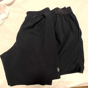 2 black under armor shorts